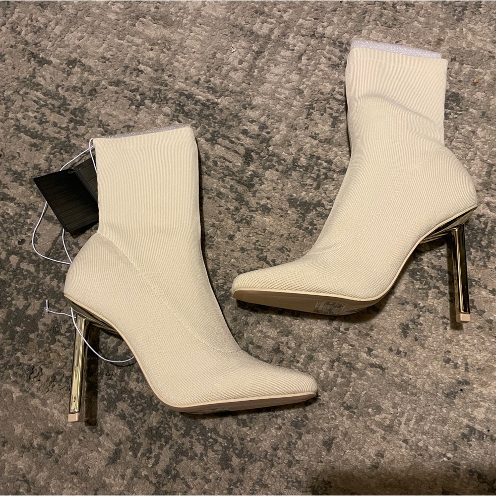 Cream-colored stiletto sock booties (F21)